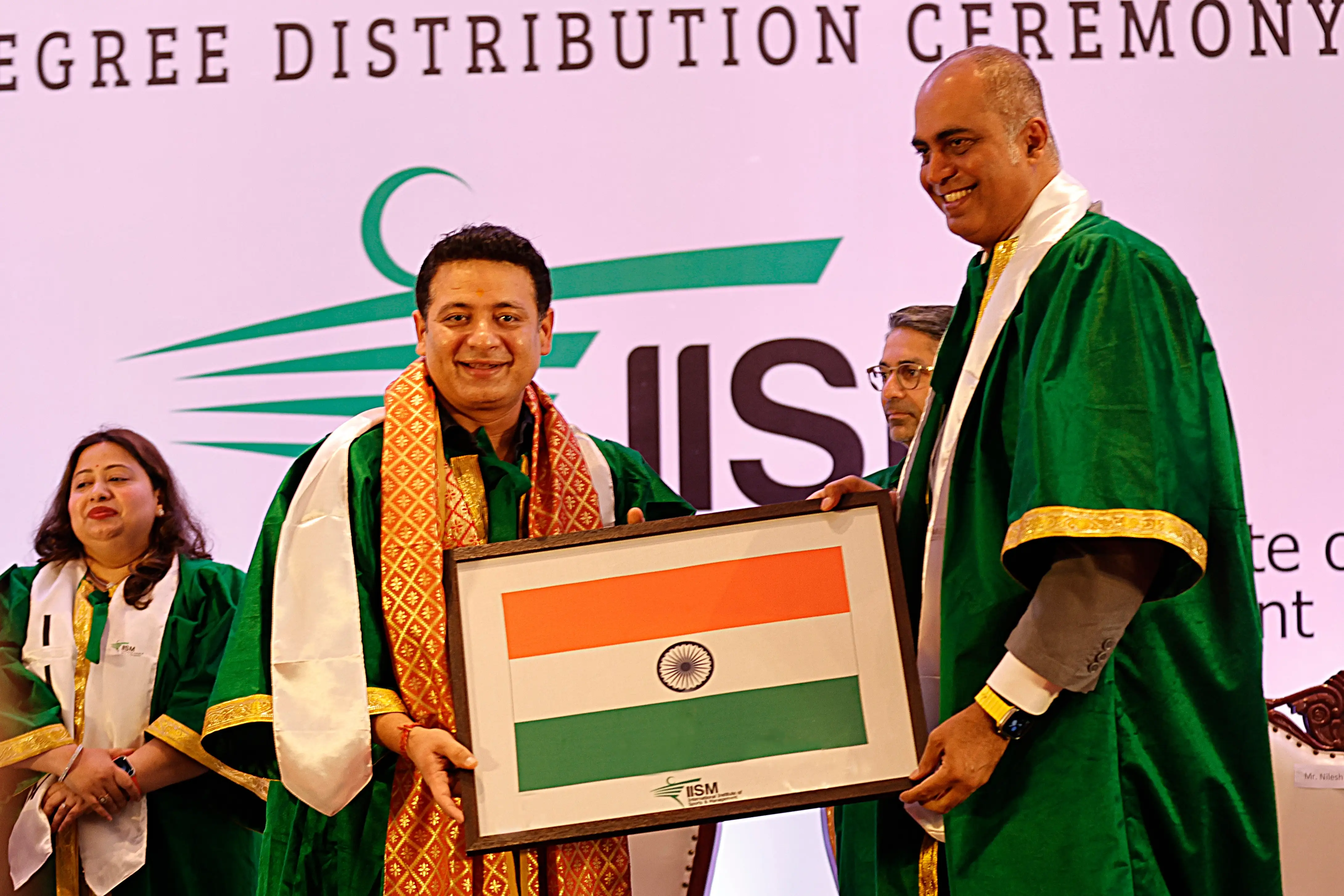 Mr. Nilesh Kulkarni Felicitating Shri. Shri. Piyush Chawla with National Flag