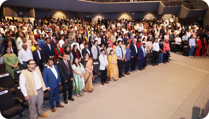Audience standing for National Anthem