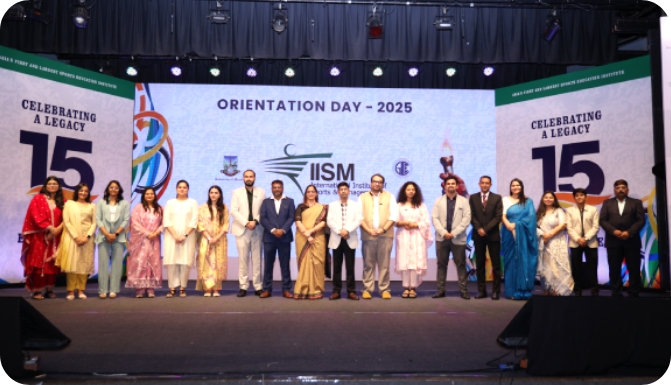IISM Faculties standing on the Orientation-stage