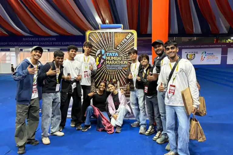 Students worked at the Tata Mumbai Marathon 2026