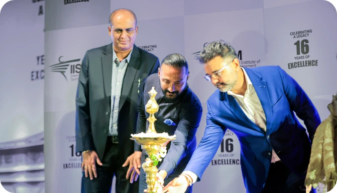 IISM guests lighting the lamp on Orientation Day 2026